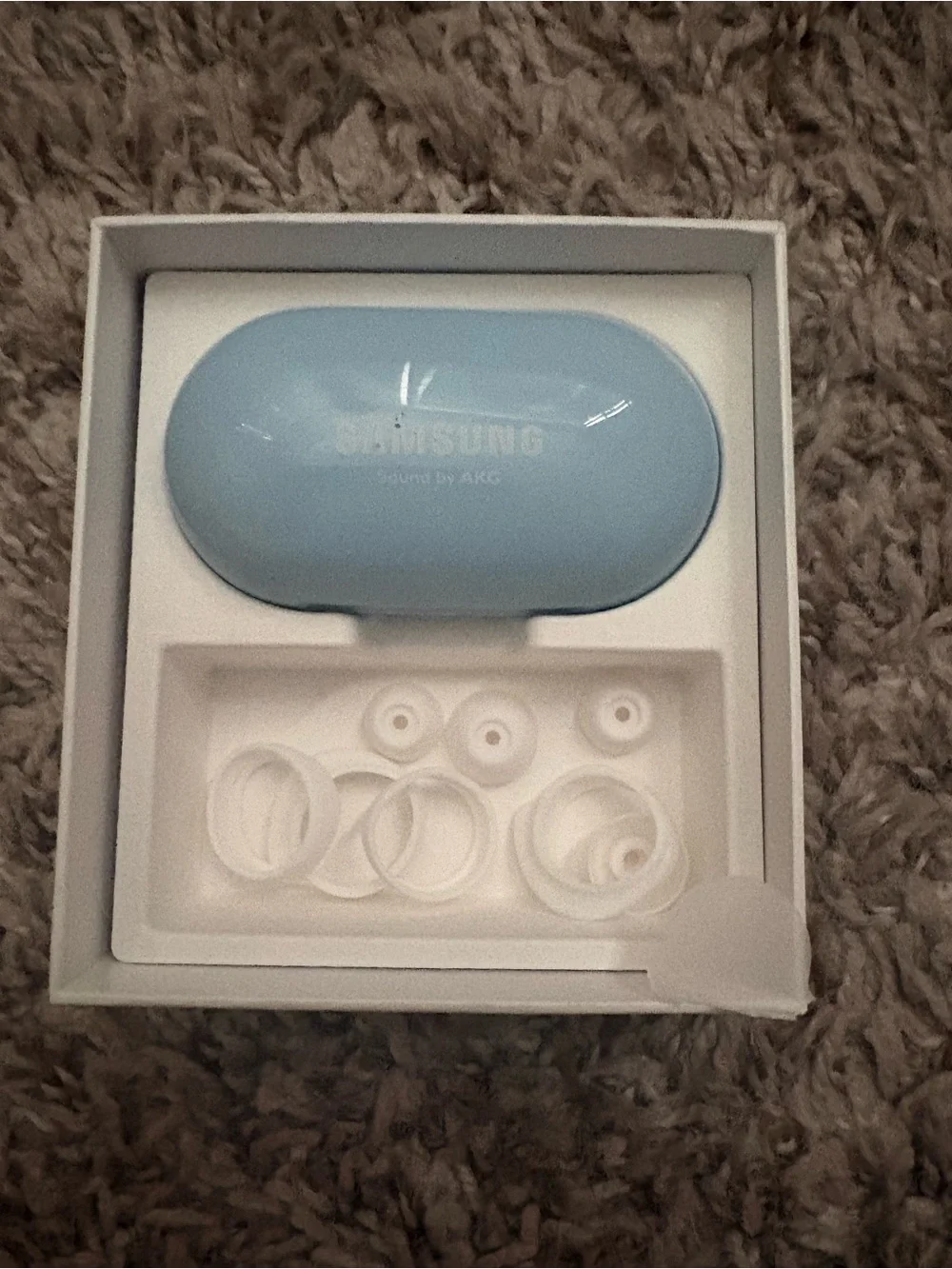 Samsung Galaxy Buds — Light Blue Earbuds and Case